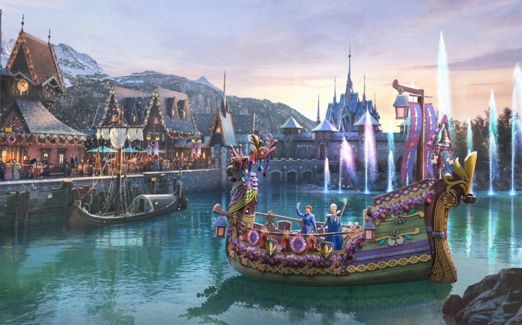 Anna y Elsa durante la ceremonia navideña junto al fiordo de Arendelle en World of Frozen
